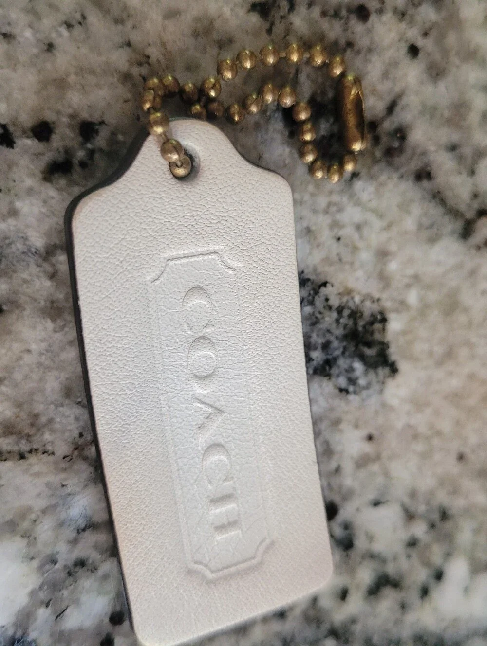 Coach Vintage White Leather Tag